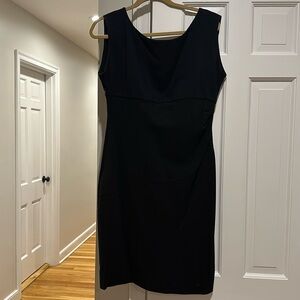 Diane von Furstenberg black dress, size 14. Diagonal bias design on front.